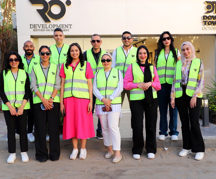 Corporate team portrait outside a showroom